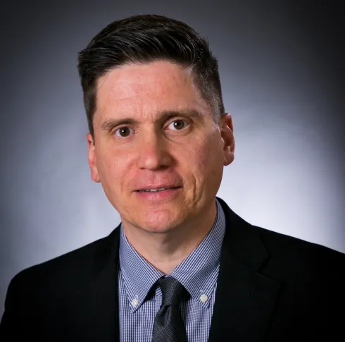 Image of Library Staff member Caleb Derven