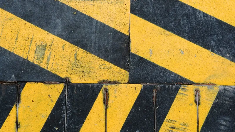 Yellow and black hazzard signs