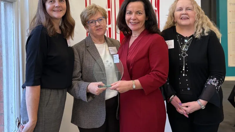 4 people with an award